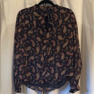 Black long sleeve blouse with mandarin collar and tie front ruffled features